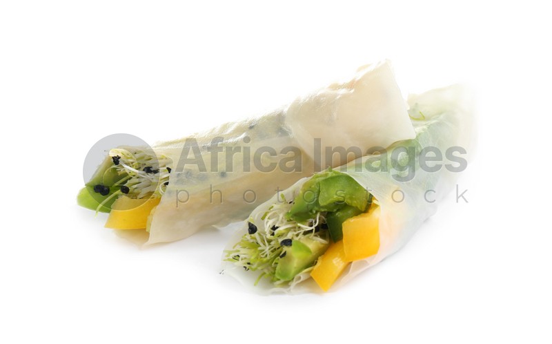 Delicious rolls wrapped in rice paper isolated on white