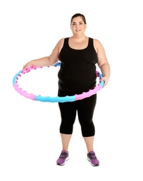 Overweight woman with hula hoop on white background