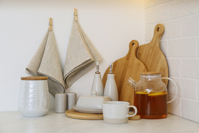 Wooden boards, napkin and kitchen items on countertop indoors