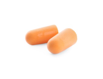 Pair of orange ear plugs isolated on white