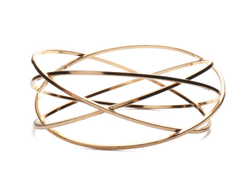 Stylish golden bracelet isolated on white. Fashionable accessory