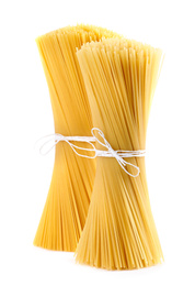 Tied uncooked Italian spaghetti isolated on white