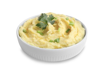 Photo of Bowl of tasty mashed potatoes with parsley and green onion isolated on white