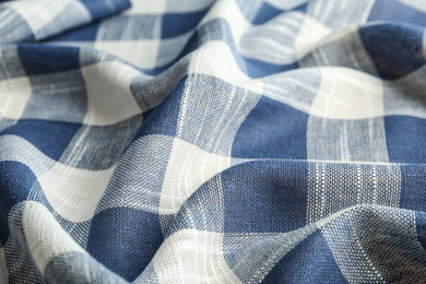 Texture of blue checkered fabric as background, closeup
