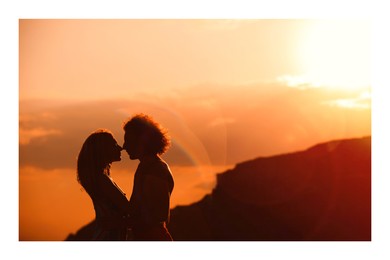 Paper photo. Young lovely couple at sunset 
