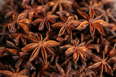 Aromatic anise stars as background, closeup view