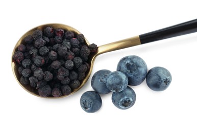 Sweet sublimated and fresh blueberries on white background, top view
