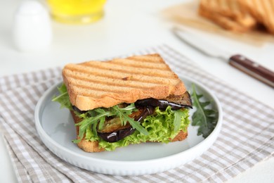 Delicious fresh sandwich with eggplant served on white table