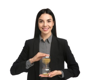 Businesswoman holding hourglass on white background. Time management