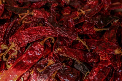 Photo of Heap of dry chilli peppers, above view