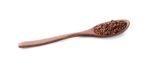 Photo of Wooden spoon with buckwheat tea granules on white background