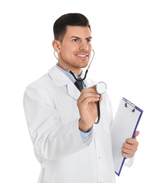 Portrait of doctor with clipboard and stethoscope on white background