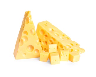 Photo of Pieces of cheese with holes on white background