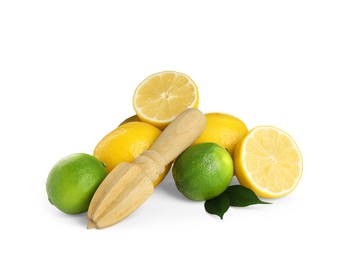 Wooden juicer, fresh lime and lemons on white background