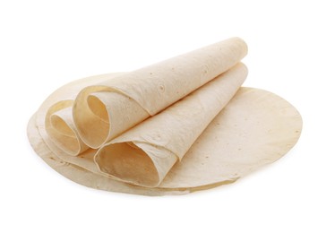 Photo of Delicious rolled Armenian lavash on white background