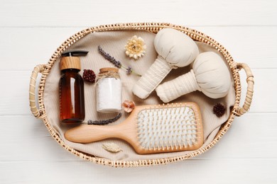 Spa gift set with different personal care products on white wooden table, top view
