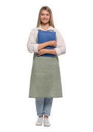 Beautiful young woman in clean apron with clipboard on white background