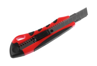Red utility knife isolated on white. Construction tool