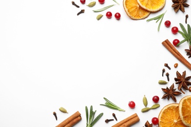 Different mulled wine ingredients on white background, flat lay. Space for text