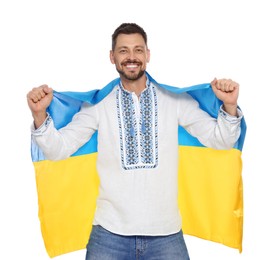 Happy man in Ukrainian national clothes with flag of Ukraine on white background
