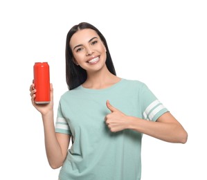 Beautiful happy woman holding red beverage can and showing thumbs up on white background
