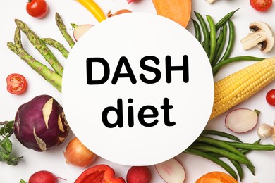 Balanced food for DASH diet to stop hypertension. Assortment of fresh vegetable on white table, flat lay