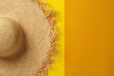 Straw hat on color background, top view with space for text. Sun protection