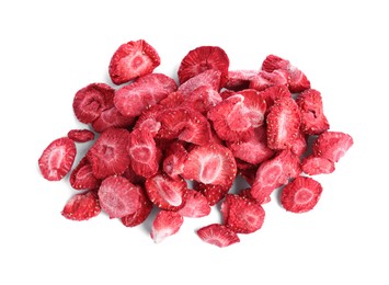Photo of Pile of freeze dried strawberries on white background, top view