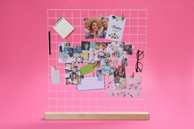 Vision board with different photos and other elements representing dreams on pink background