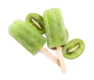 Photo of Tasty kiwi ice pops isolated on white, top view. Fruit popsicle