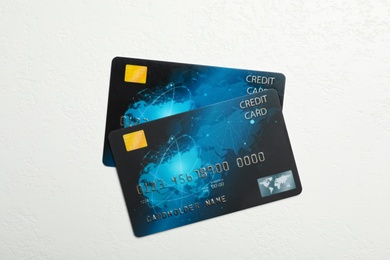 Credit cards on white table, flat lay