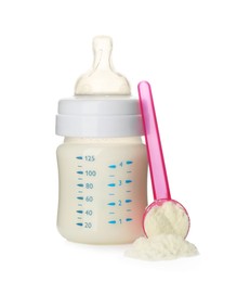 Feeding bottle with infant formula and scoop of powder on white background. Baby milk