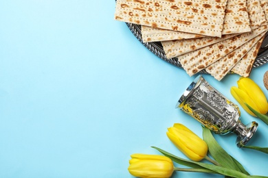 Flat lay composition with matzo and space for text on color background. Passover (Pesach) Seder