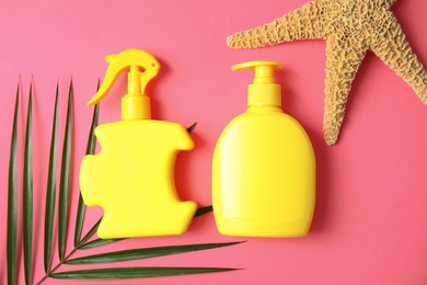 Flat lay composition with sun protection products on color background