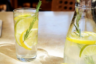 Photo of Summer refreshing lemonade drink on light table