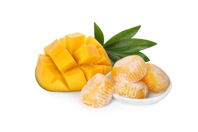 Delicious mochi with green leaves and mango on white background. Traditional Japanese dessert