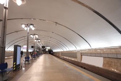 Spacious subway station with sitting places. Public transport