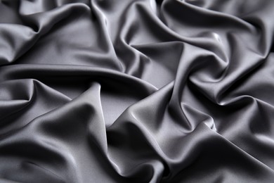 Texture of delicate black silk as background, closeup
