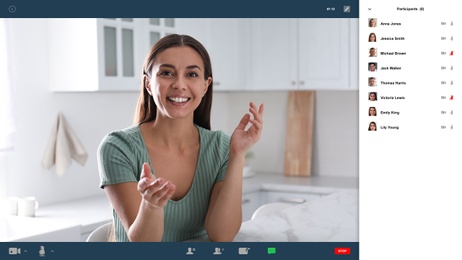 Woman communicating with coworkers from home using video chat, view through camera