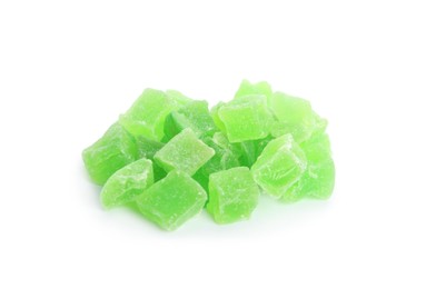 Delicious green candied fruit pieces on white background