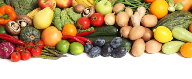 Photo of Assortment of fresh organic fruits and vegetables on white background