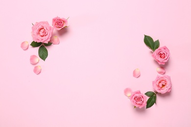 Photo of Beautiful floral composition with flowers on pink background, flat lay. Space for text