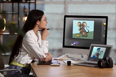 Image of Animator working with computer and laptop. Illustrations on screens