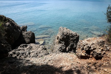 Beautiful view of rocky sea coast on sunny summer day