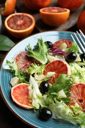 Plate of delicious sicilian orange salad on table, closeup