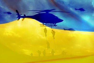 Soldiers landing from helicopter on battlefield and Ukrainian national flag, double exposure