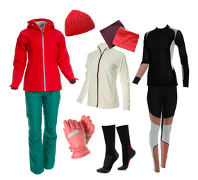 Collection of stylish winter sports clothes on white background