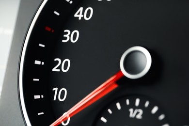 Photo of Closeup view of modern electronic car speedometer
