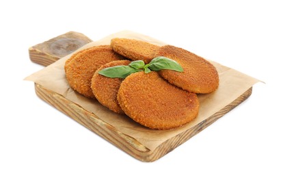 Photo of Delicious fried breaded cutlets with basil leaves isolated on white