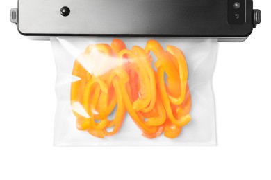 Sealer for vacuum packing and plastic bag with bell pepper on white background, top view